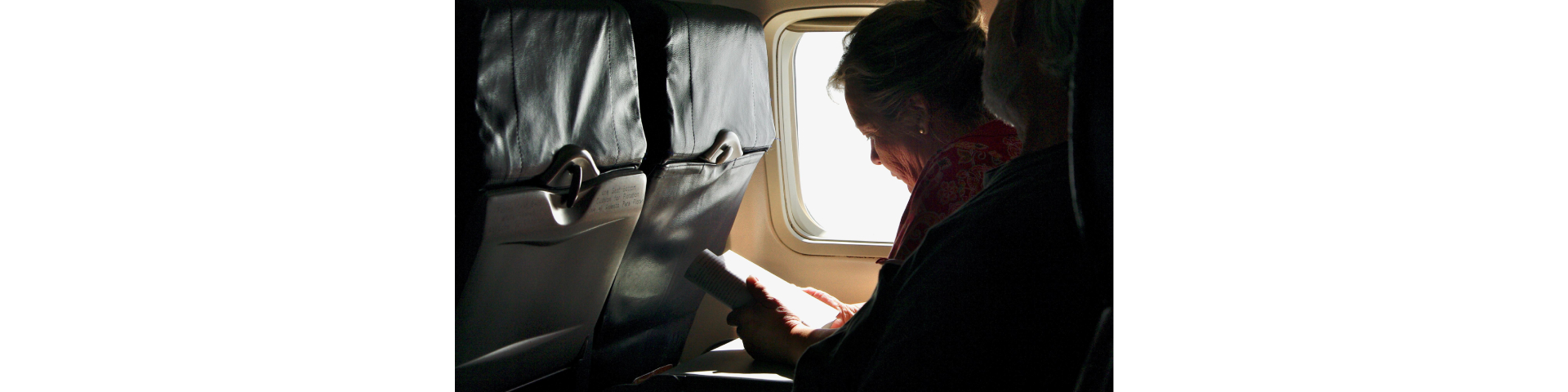 an image of a woman reading a book